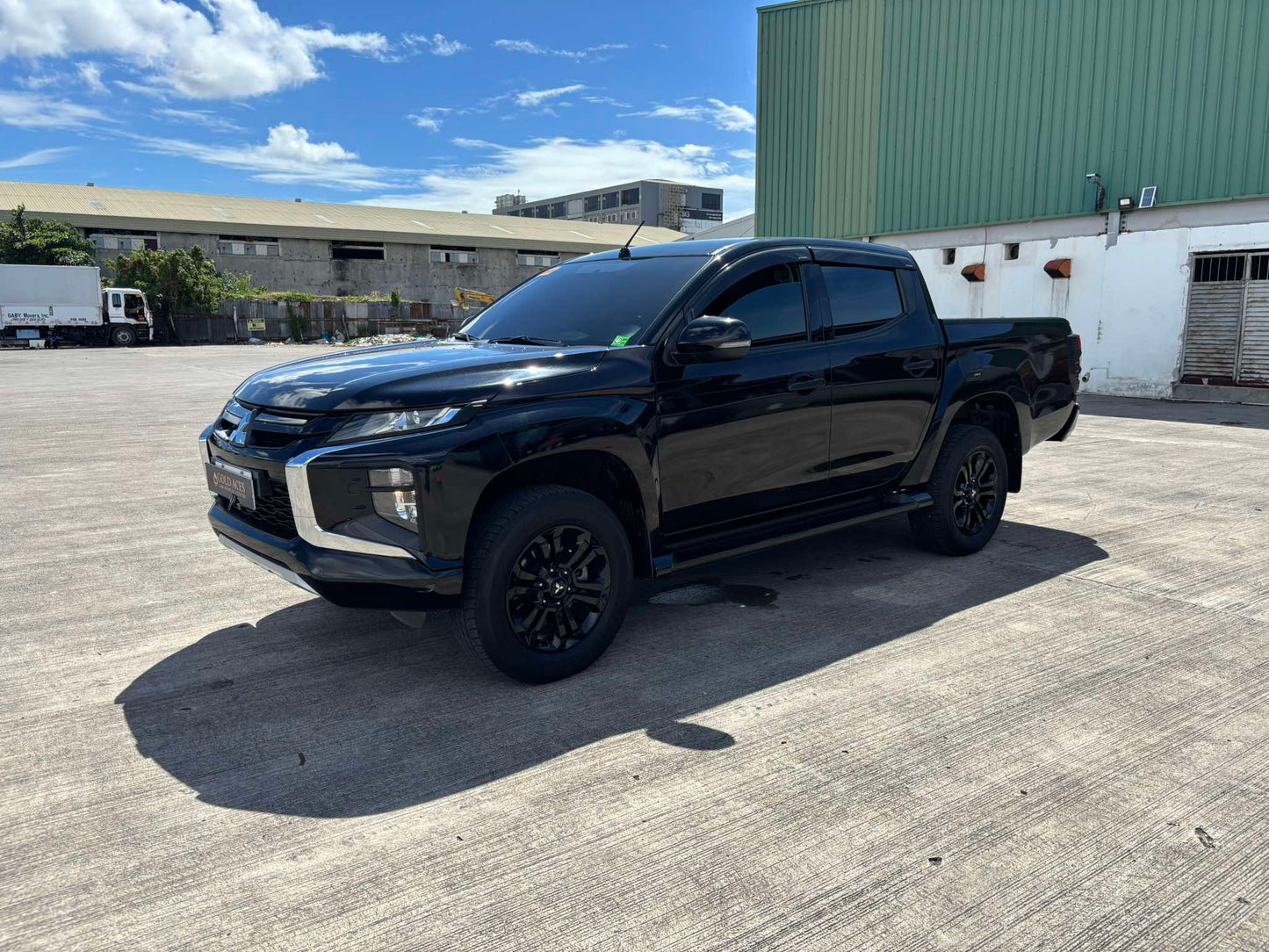 2023 MITSUBISHI STRADA GLS 2.4L 4X2 AUTOMATIC TRANSMISSION Gold Aces Car Display Center