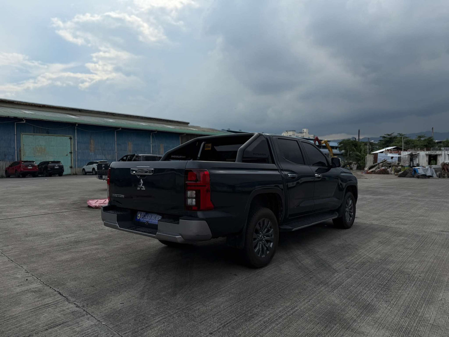 2024 MITSUBISHI TRITON 2.4L DIESEL GLS 4X2 2.4L AUTOMATIC TRANSMISSION Gold Aces Car Display Center