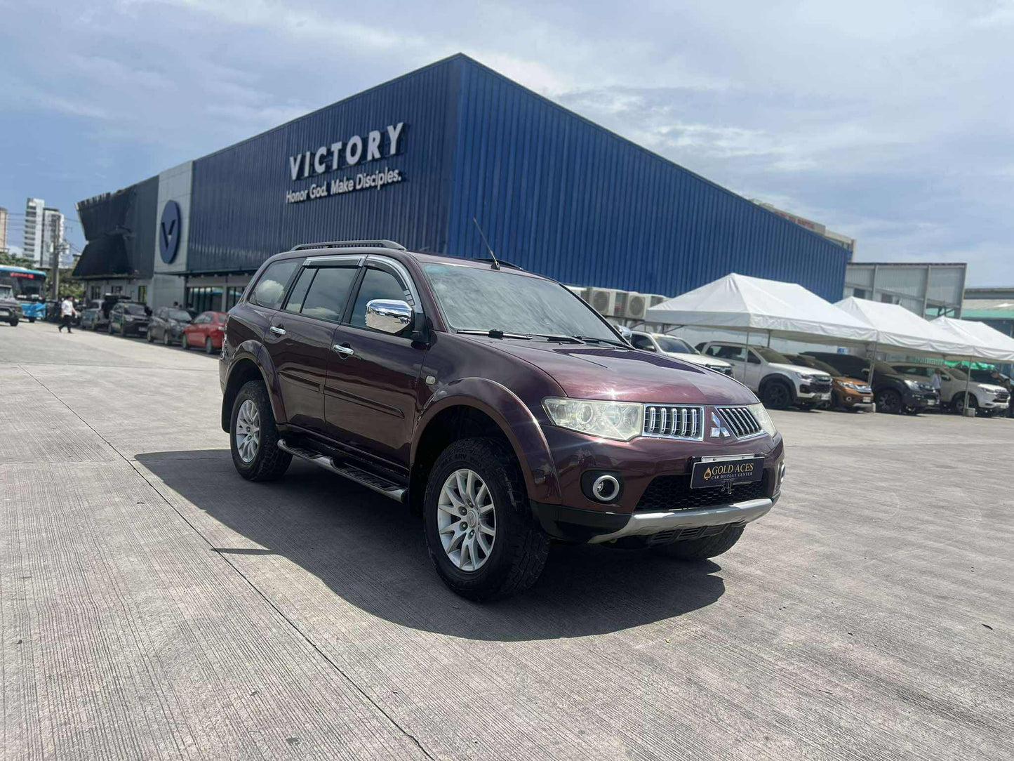 2012 MITSUBISHI MONTERO SPORTS GLS 2.5L DSL AUTOMATIC TRANSMISSION Gold Aces Car Display Center