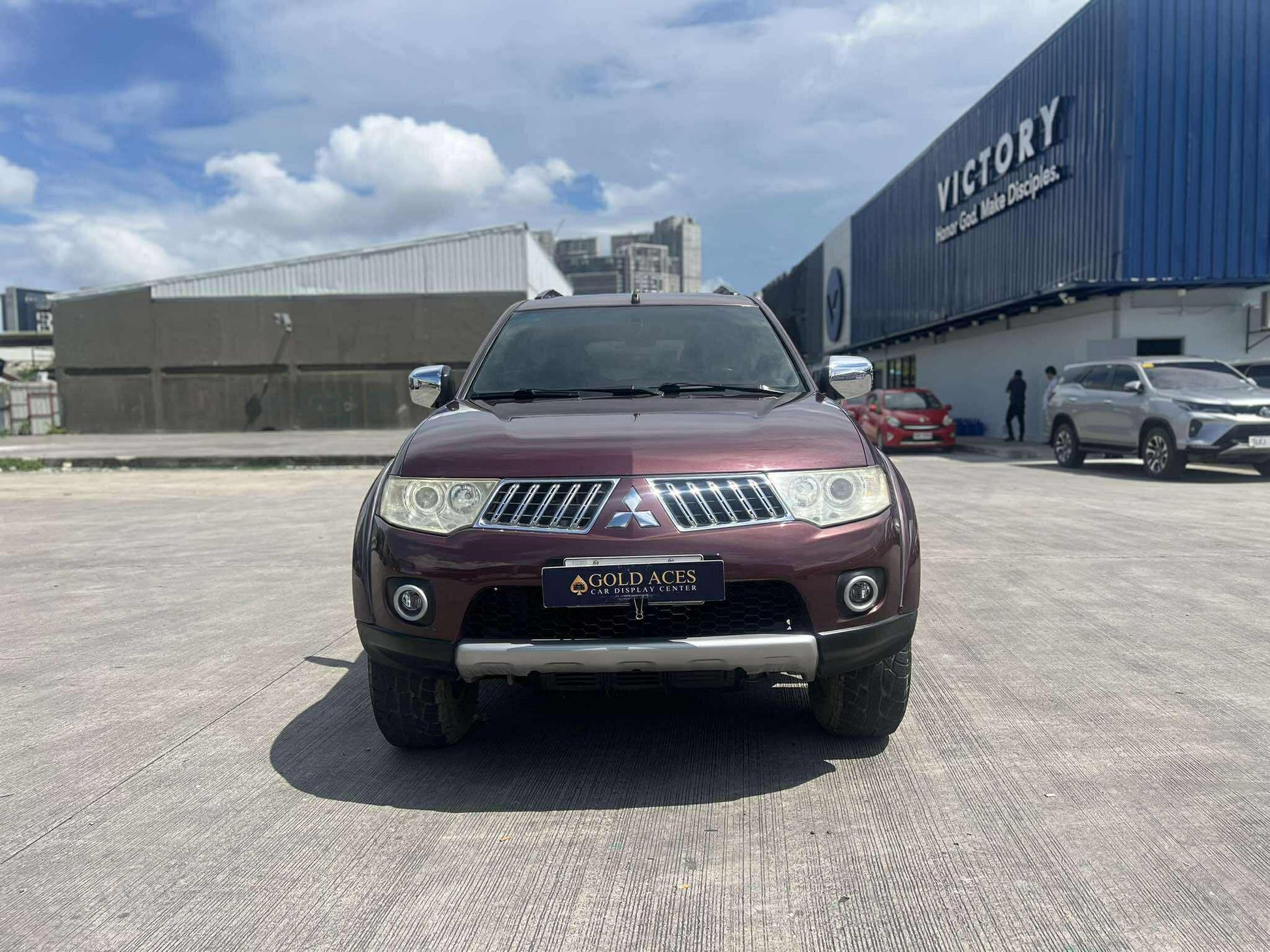 2012 MITSUBISHI MONTERO SPORTS GLS 2.5L DSL AUTOMATIC TRANSMISSION Gold Aces Car Display Center