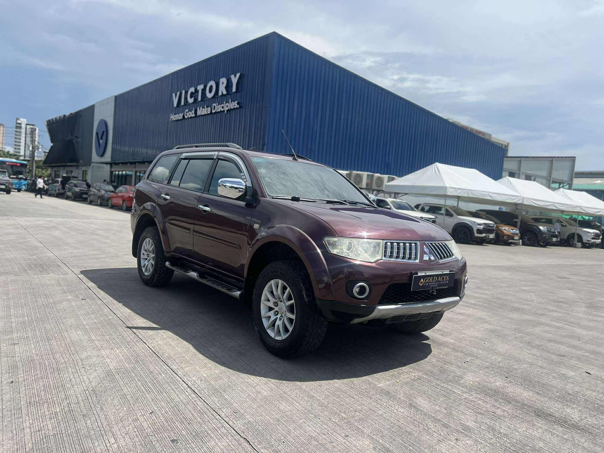 2012 MITSUBISHI MONTERO SPORTS GLS 2.5L DSL AUTOMATIC TRANSMISSION Gold Aces Car Display Center