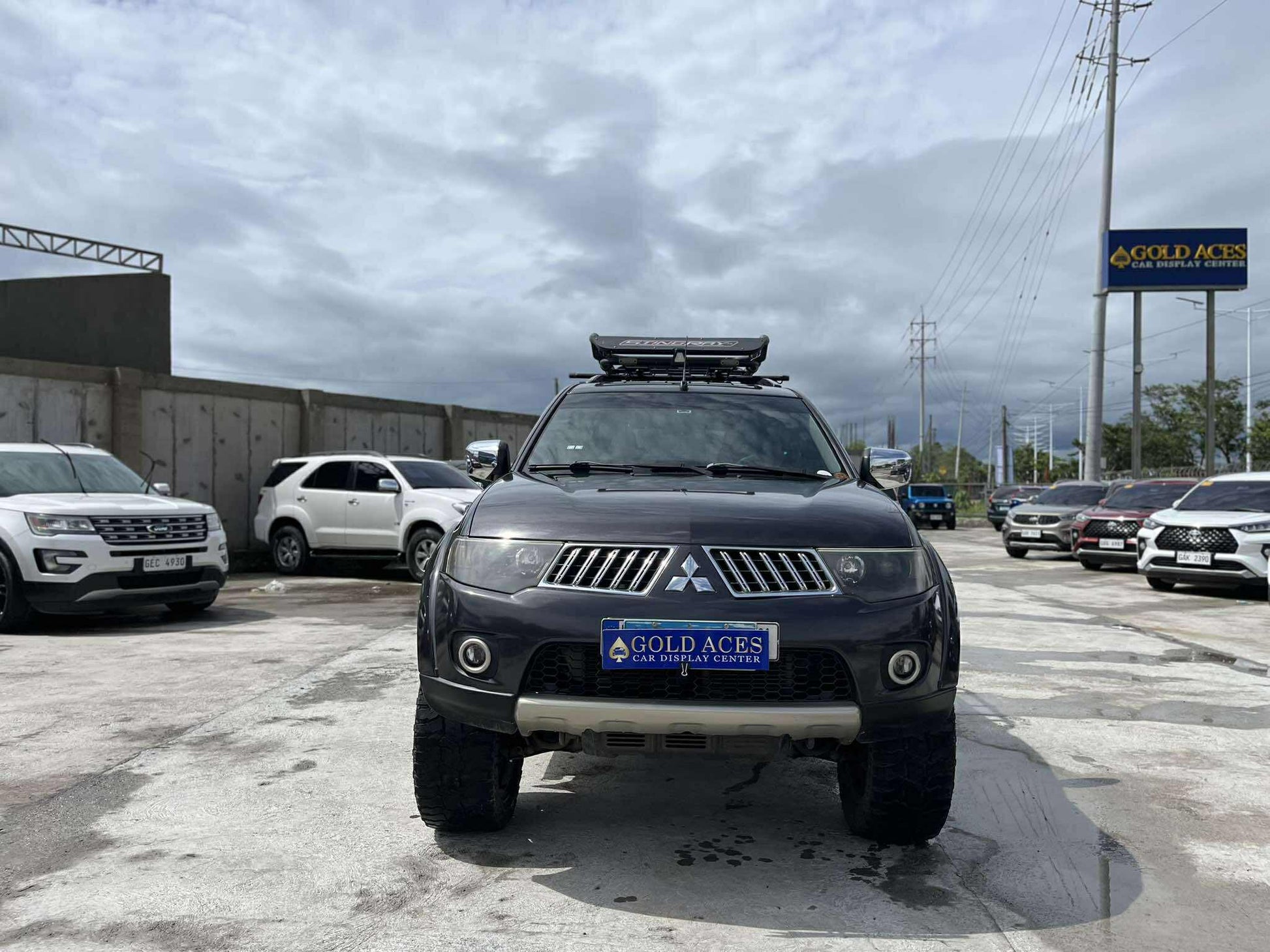 2012 MITSUBISHI MONTERO SPORT GLS V 2.5L DSL AUTOMATIC TRANSMISSION Gold Aces Car Display Center