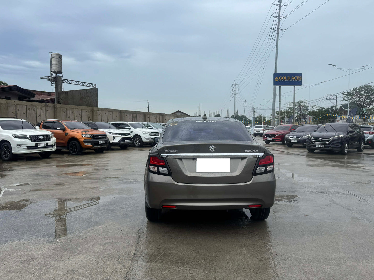 2021 SUZUKI DZIRE 1.2 GL AMT AUTOMATIC TRANSMISSION Gold Aces Car Display Center