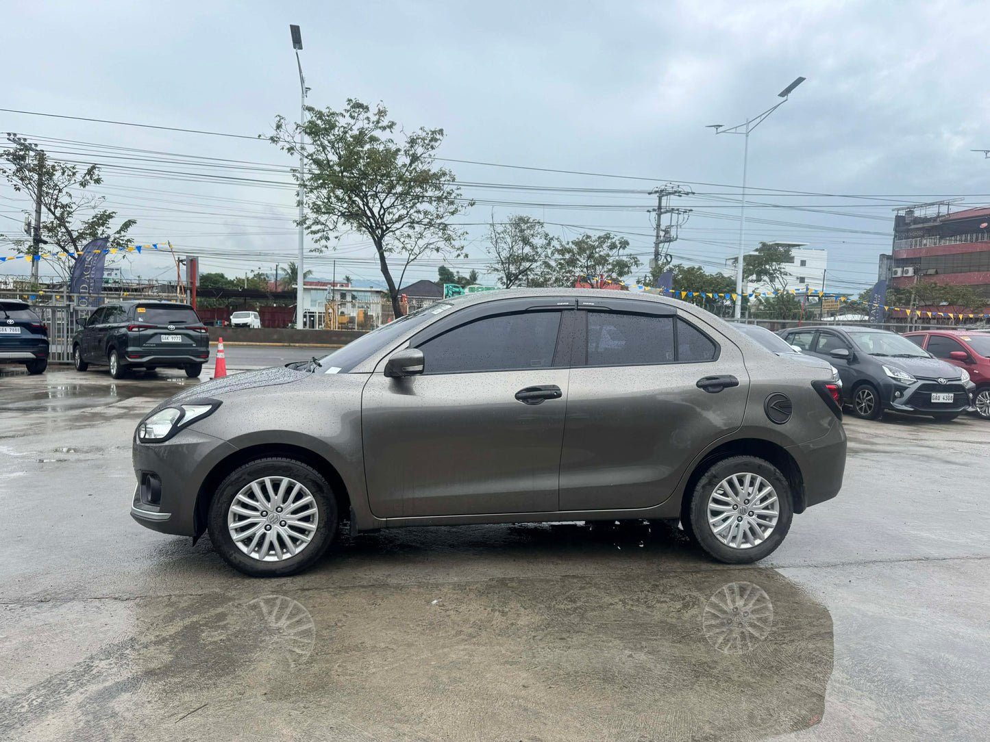 2021 SUZUKI DZIRE 1.2 GL AMT AUTOMATIC TRANSMISSION Gold Aces Car Display Center