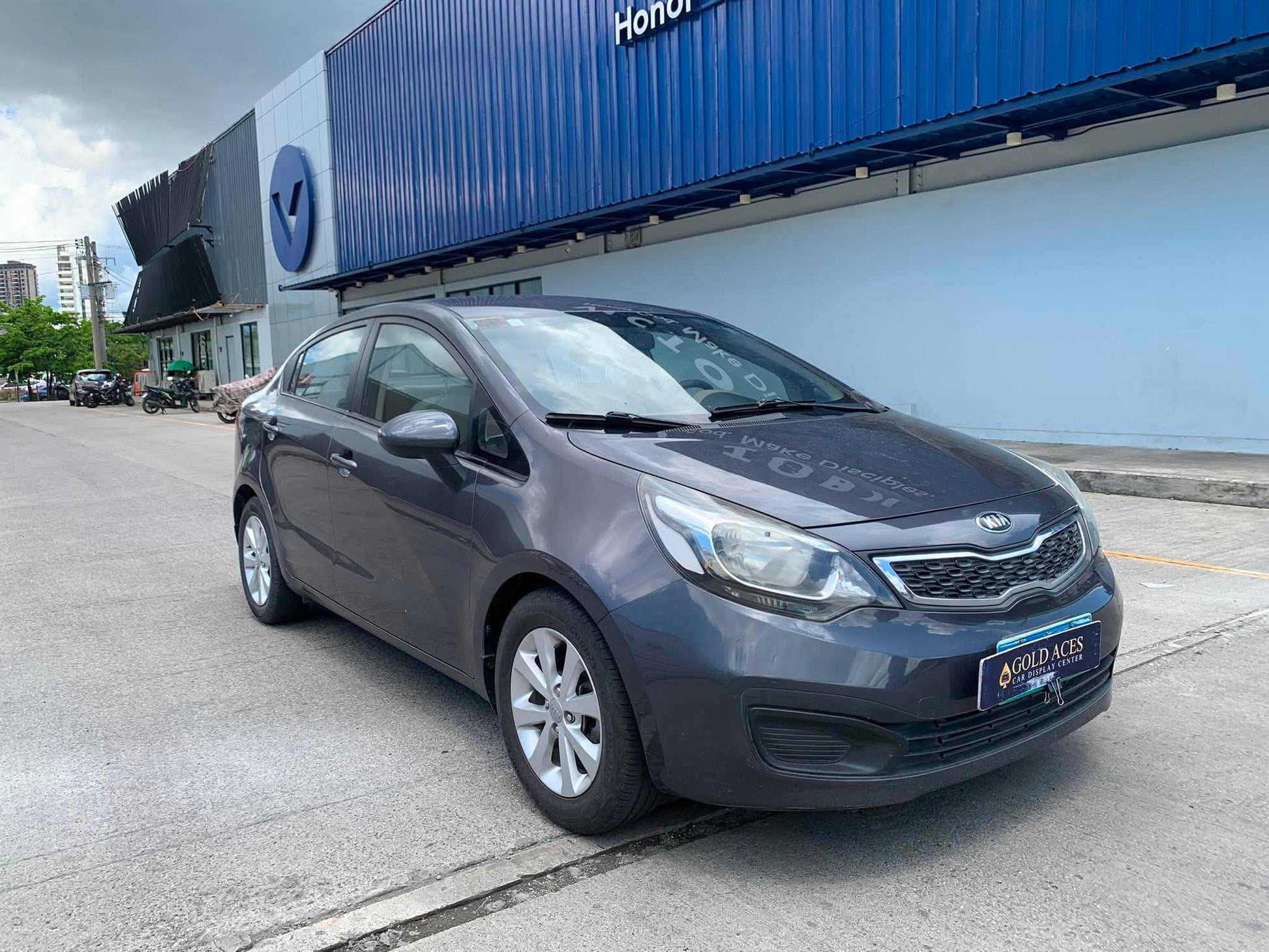 2012 KIA RIO EX 1.4 MANUAL TRANSMISSION Gold Aces Car Display Center