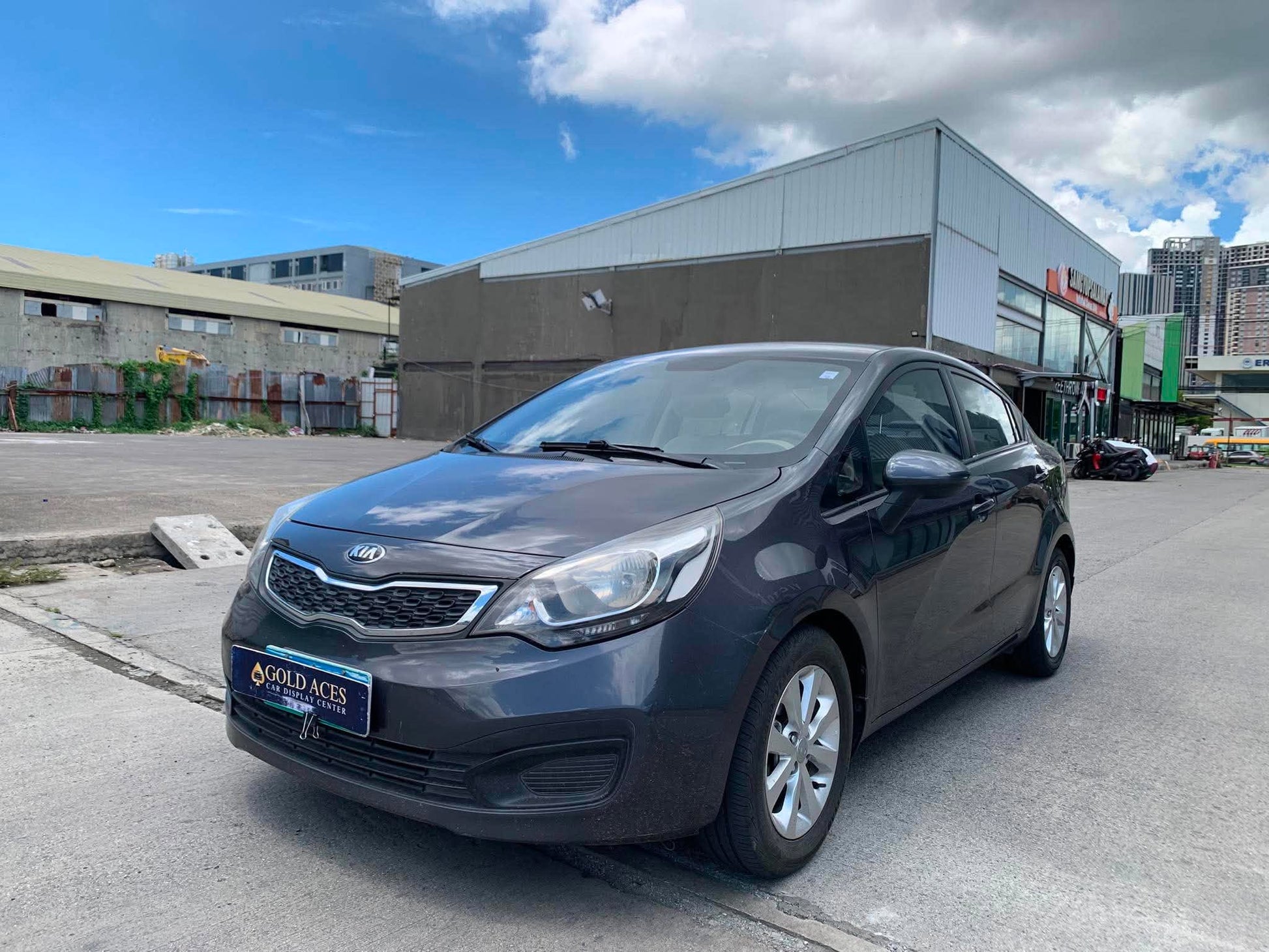 2012 KIA RIO EX 1.4 MANUAL TRANSMISSION Gold Aces Car Display Center