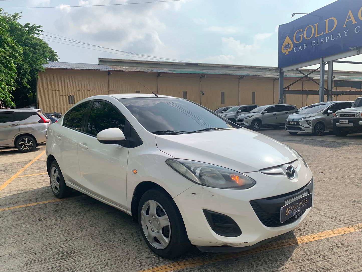 2014 MAZDA 2 1.3L SDN MANUAL TRANSMISSION (70TKMS ONLY!) Gold Aces Car Display Center