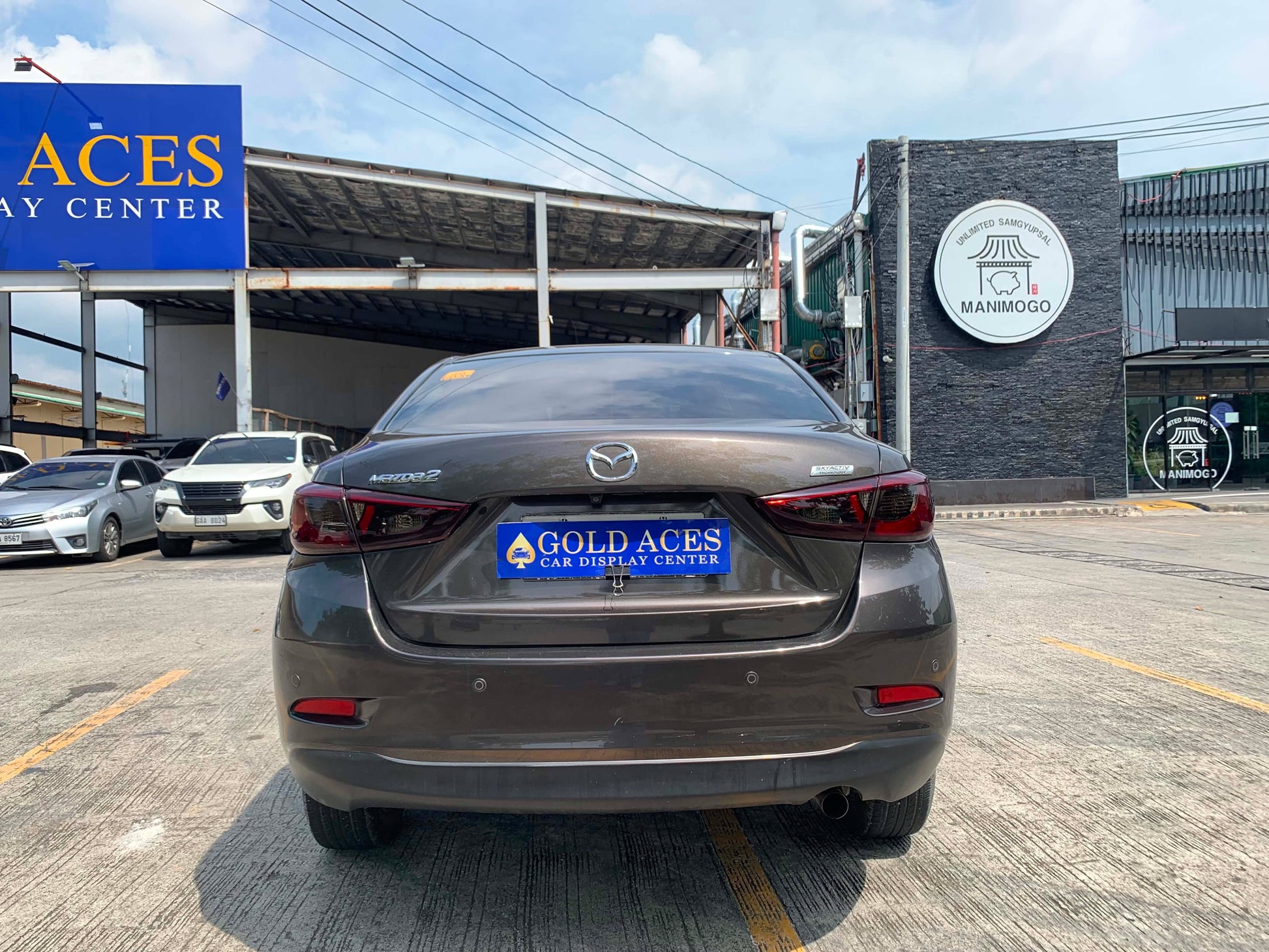 2017 MAZDA 2 2.0L SEDAN AUTOMATIC TRANSMISSION (67TKMS ONLY!) Gold Aces Car Display Center
