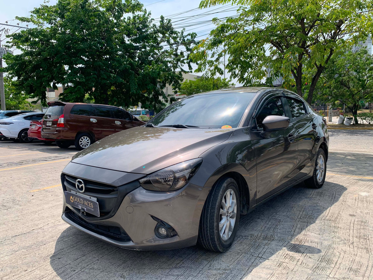 2017 MAZDA 2 2.0L SEDAN AUTOMATIC TRANSMISSION (67TKMS ONLY!) Gold Aces Car Display Center