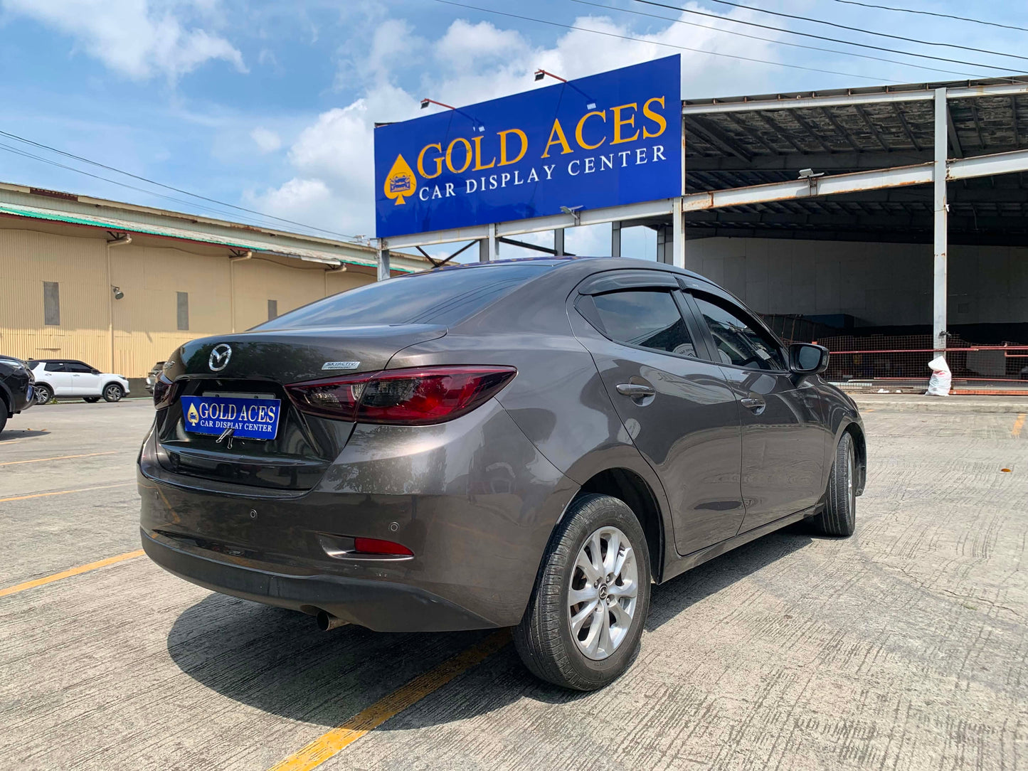 2017 MAZDA 2 2.0L SEDAN AUTOMATIC TRANSMISSION (67TKMS ONLY!) Gold Aces Car Display Center