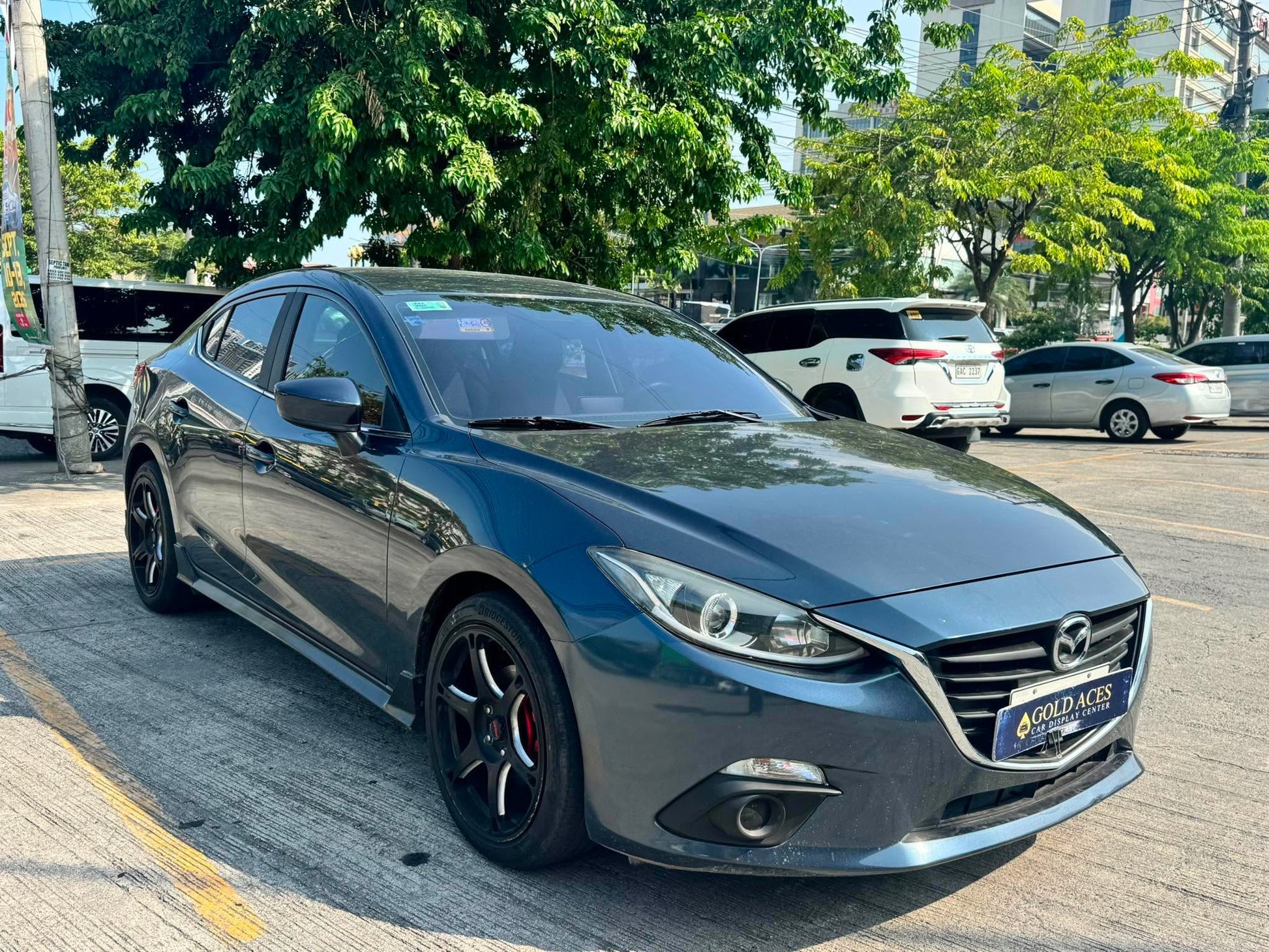 2014 MAZDA 3 SEDAN AUTOMATIC TRANSMISSION Gold Aces Car Display Center