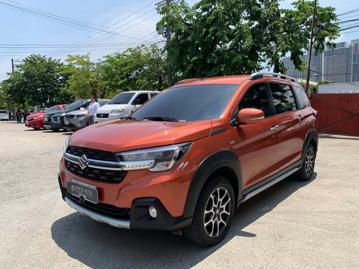 2023 SUZUKI XL7 1.5L GLX AUTOMATIC TRANSMISSION (5TKMS ONLY!) Gold Aces Car Display Center