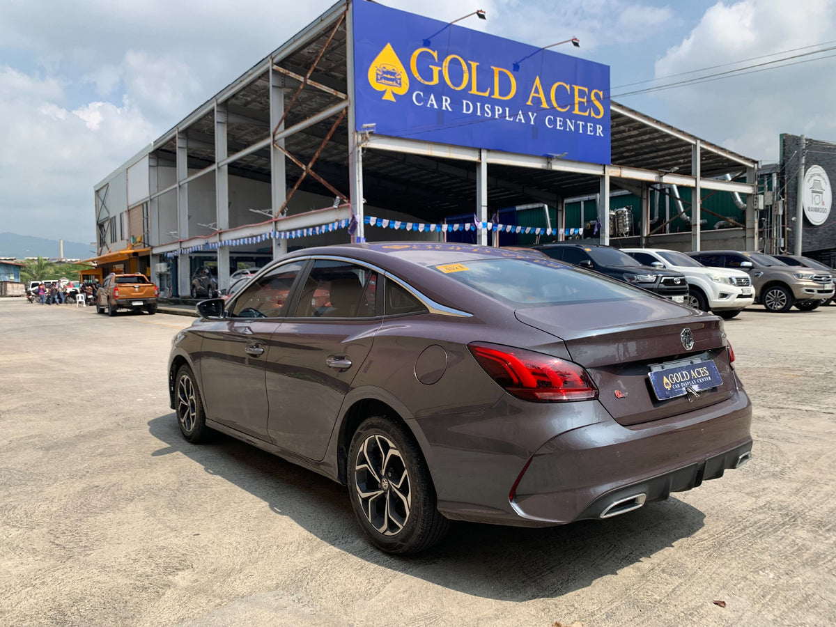 2025 MG GT ALPHA 1.5L AUTOMATIC TRANSMISSION (9TKMS ONLY!) Gold Aces Car Display Center