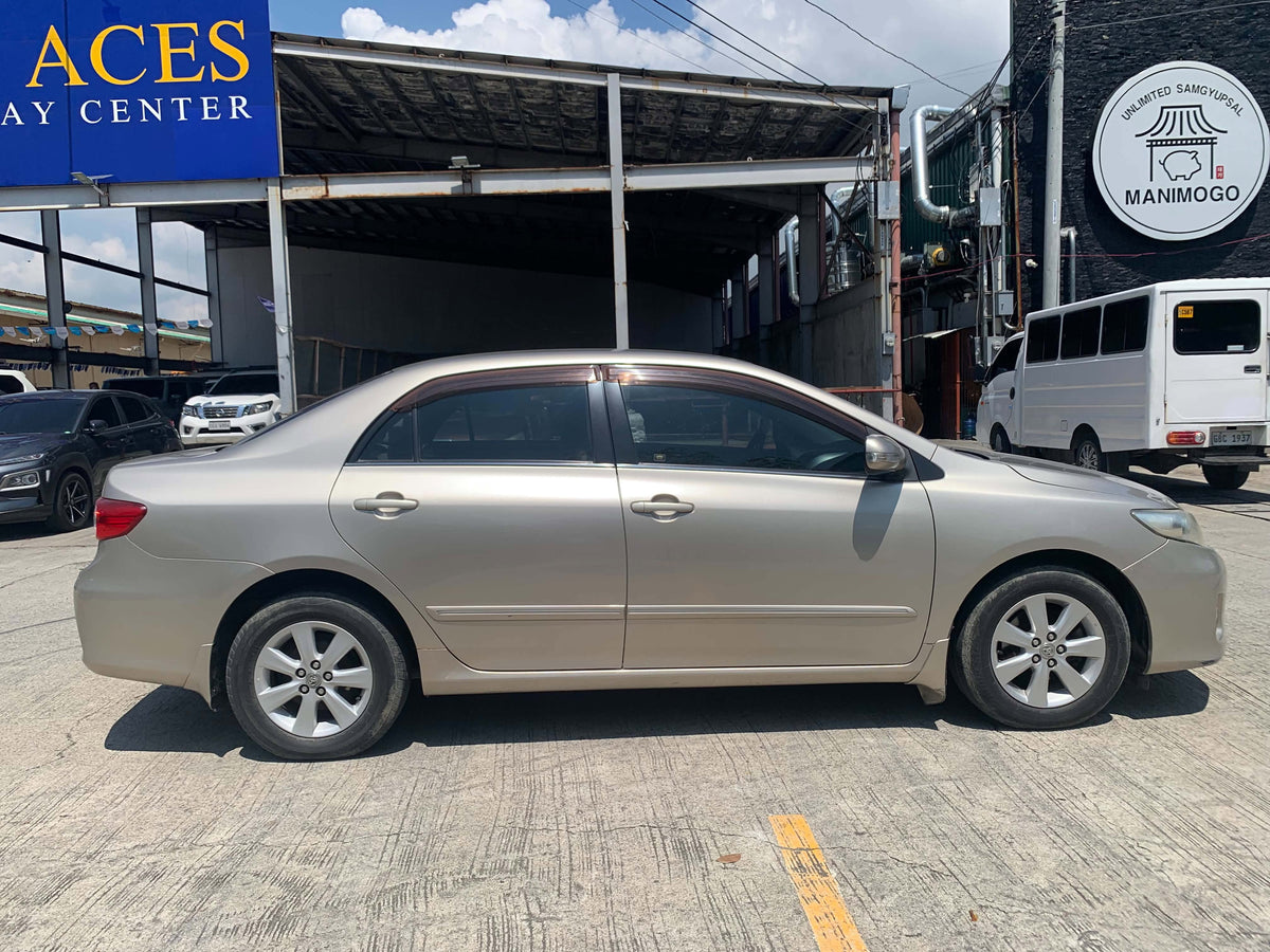 2011 TOYOTA ALTIS 1.6L G MANUAL TRANSMISSION Gold Aces Car Display Center