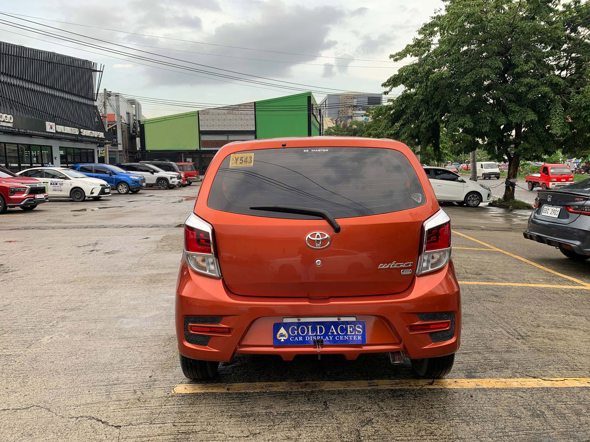 2018 TOYOTA WIGO E 1.0L MANUAL TRANSMISSION Gold Aces Car Display Center