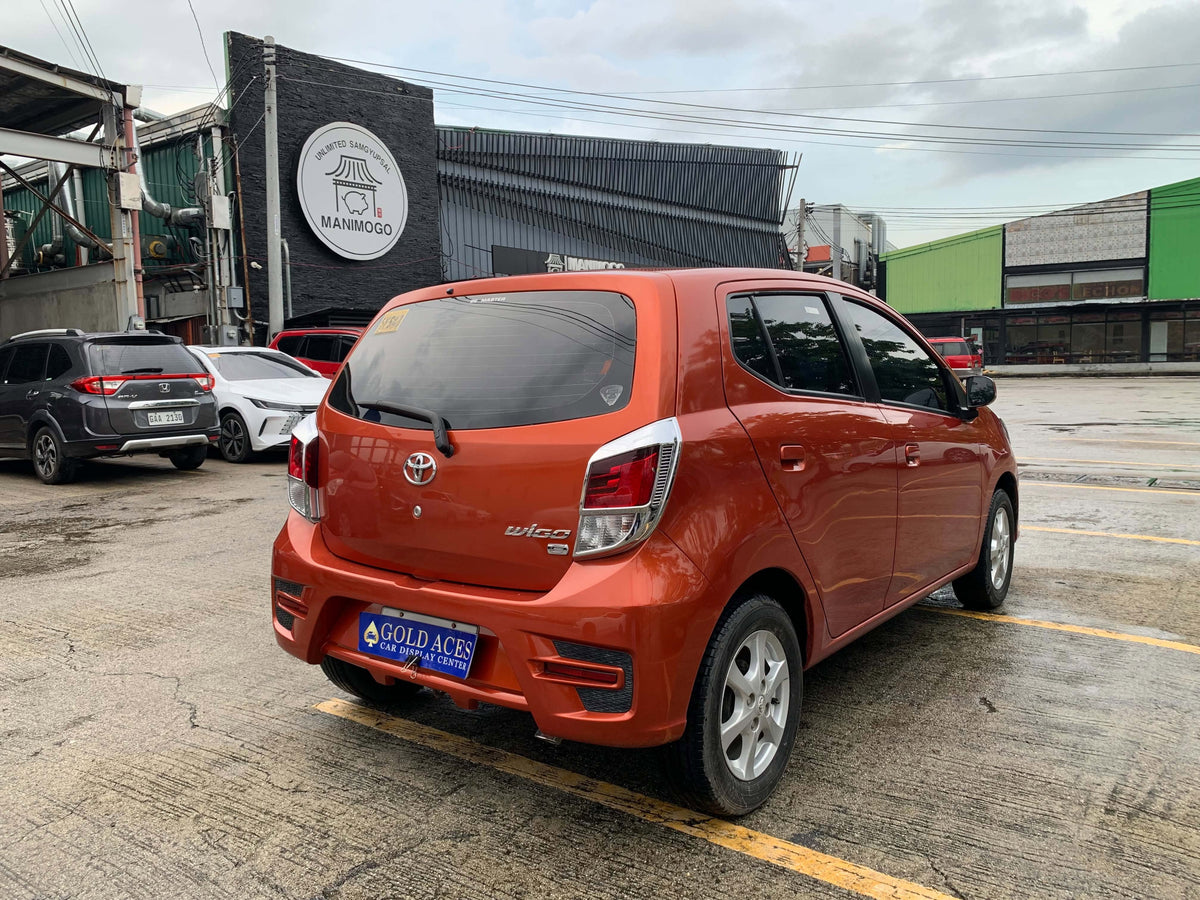 2018 TOYOTA WIGO E 1.0L MANUAL TRANSMISSION Gold Aces Car Display Center